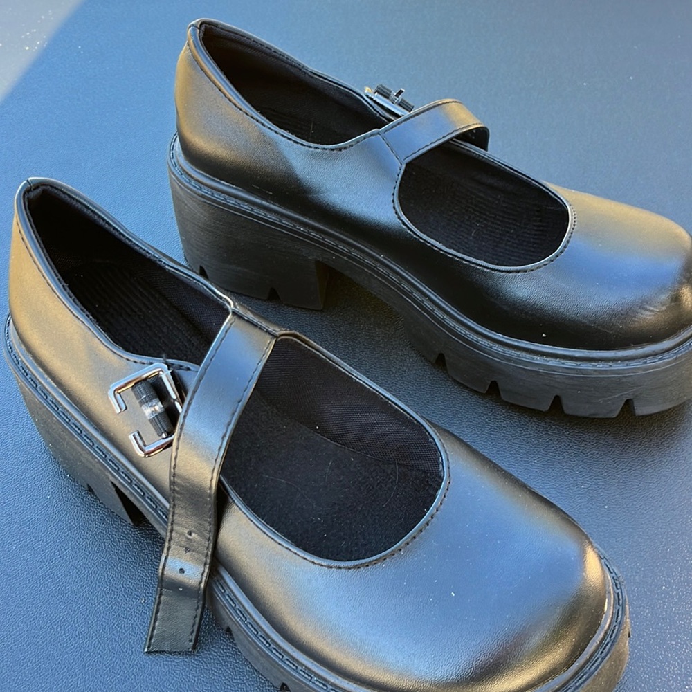 Platform ‘Mary Jane’ style shoes.